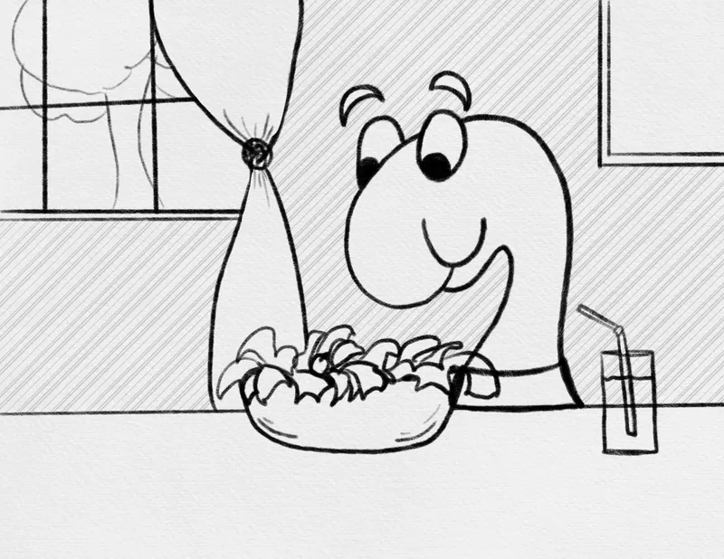 The worm eats a big bowl of salad at a table by the window